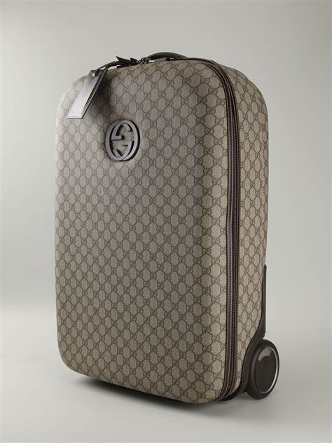 gucci hand luggage.